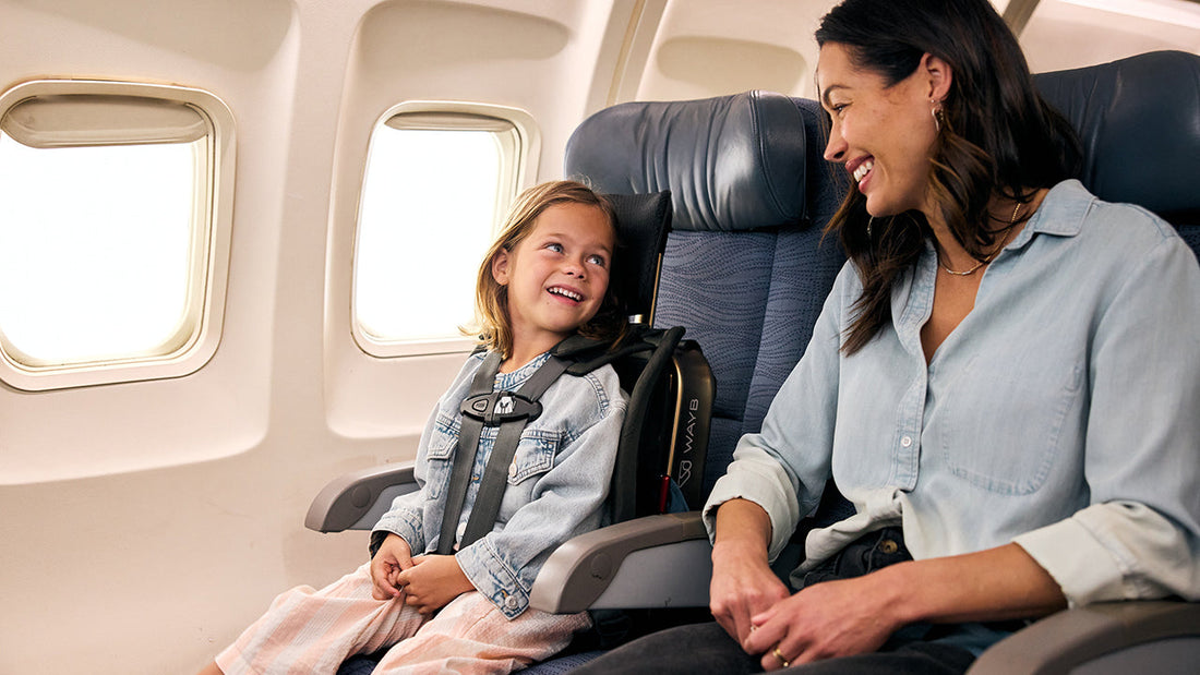 parent flying on a plan with a toddler using the WAYB Pico car seat