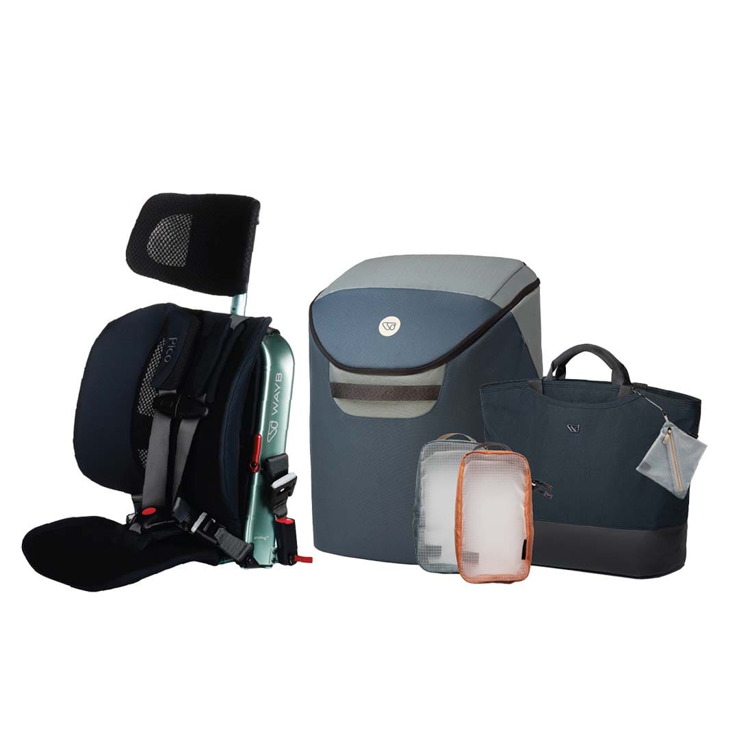 Collection of travel bags and a car seat on a white background