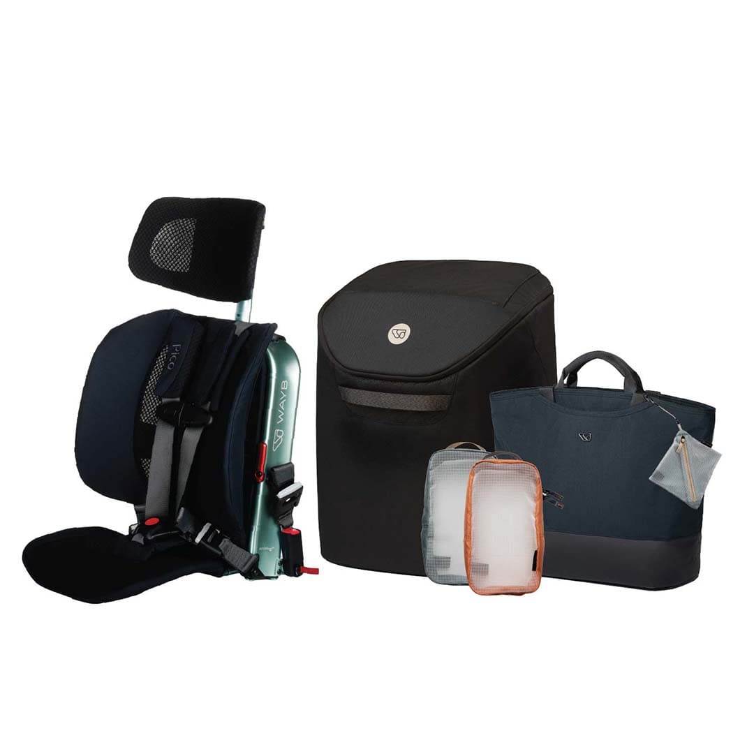 Collection of travel bags and a car seat on a white background