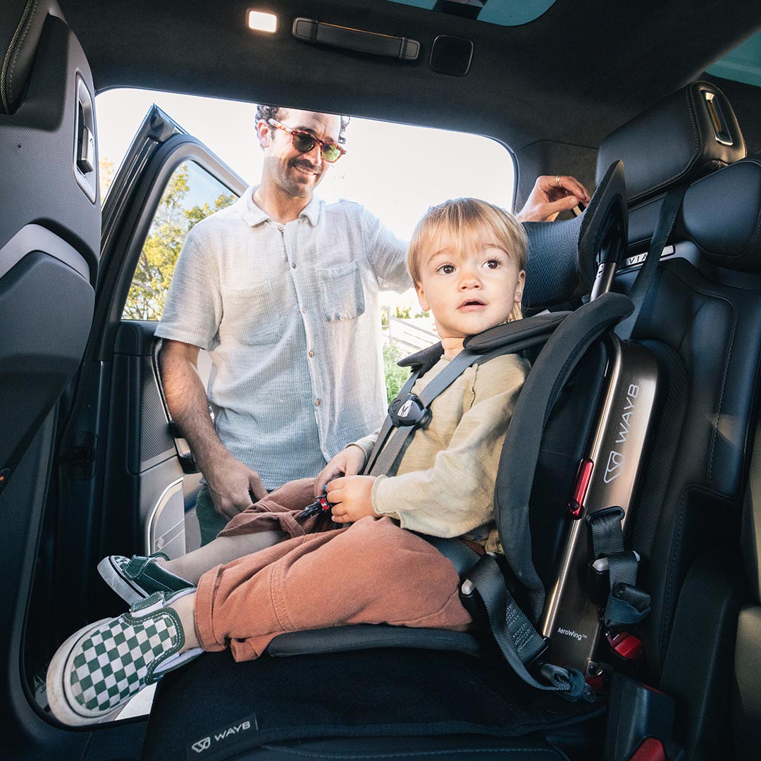 Toddler securely strapped into WAYB Pico Car Seat