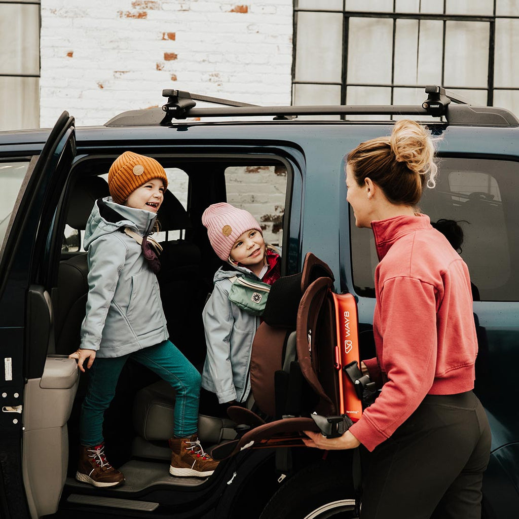 Mom and kids traveling with the WAYB Pico Car Seat