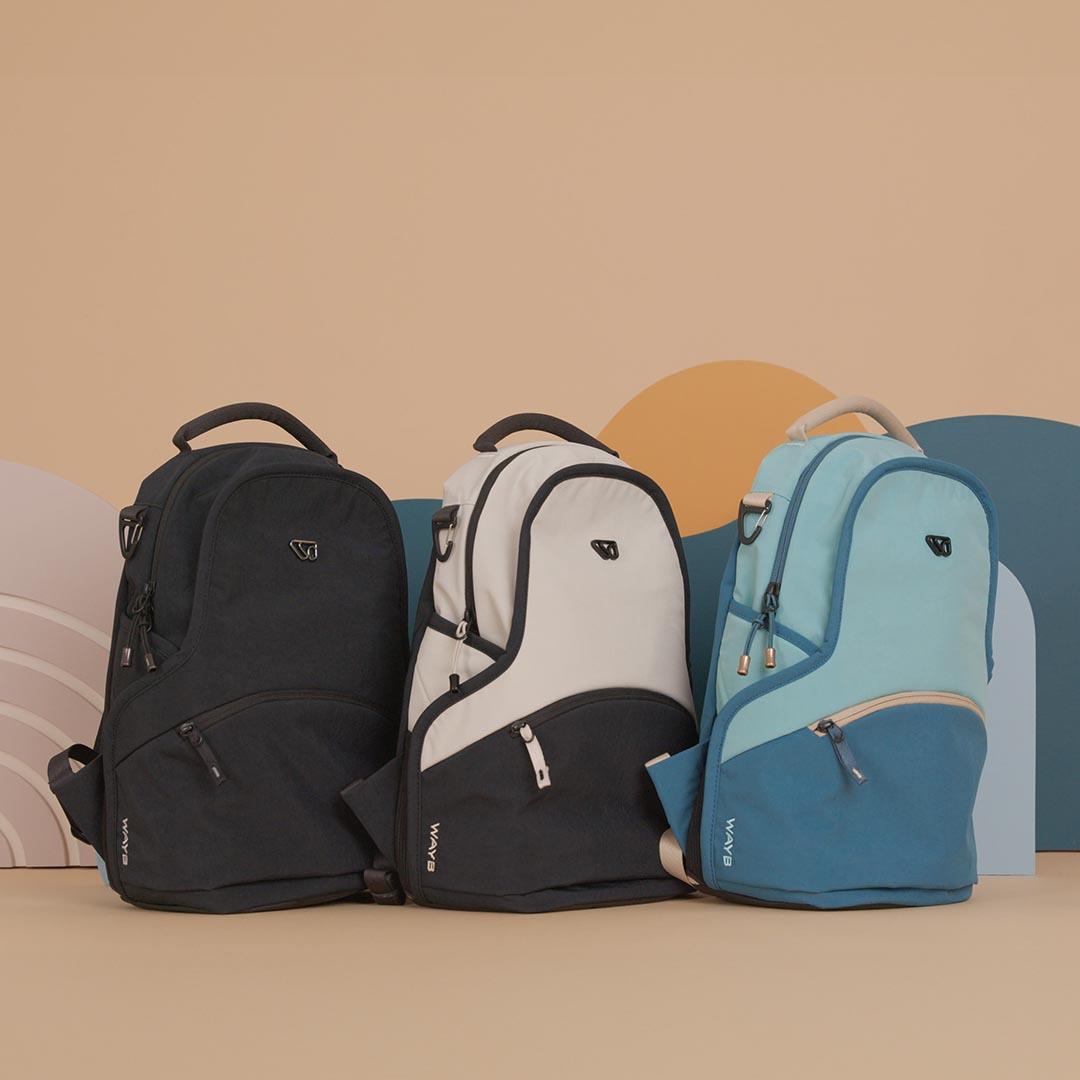 The Mini Pack essential backpack for parents in all color options: black, white and blue
