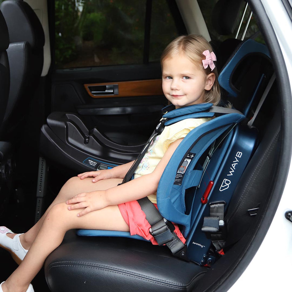 Toddler girl in WAYB Pico Car Seat in color: Midnight Sky