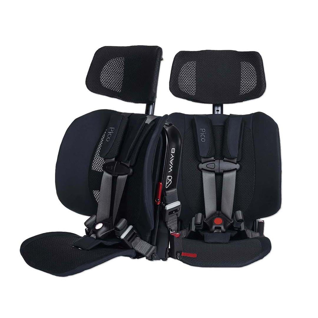 A black infant car seat with integrated headrests, side bolsters, and a footrest, shown from the side against a plain white background. The brand name 'WAYB' is visible on the side strap.