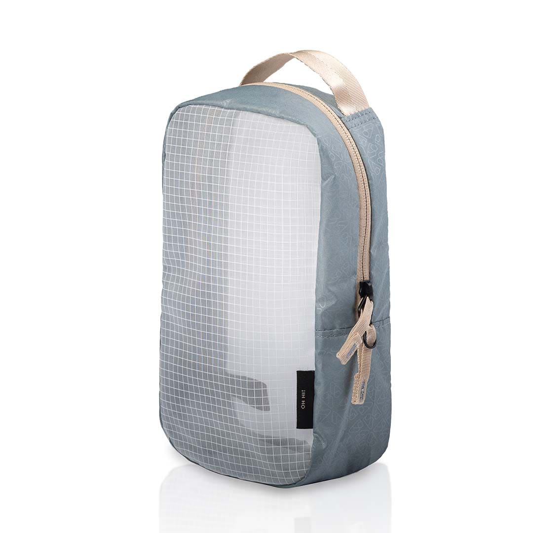 Gray grid-patterned pod with beige accents on a white background